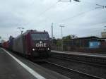 185 534-5 von OHE kam am 8.10.2010 vor einem Containerzug in Bonn-Beuel.