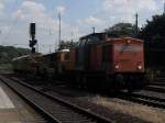 Br 203 von der Bocholter Eisenbahngesellschaft zieht einen Bauzug von der Firma Schwertbau durch Köln West am 26.6.10